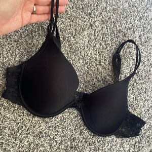 Black underwire bra lightly padded, tags removed